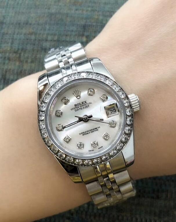 Self-winding fake watches are dazzling with diamond layout.